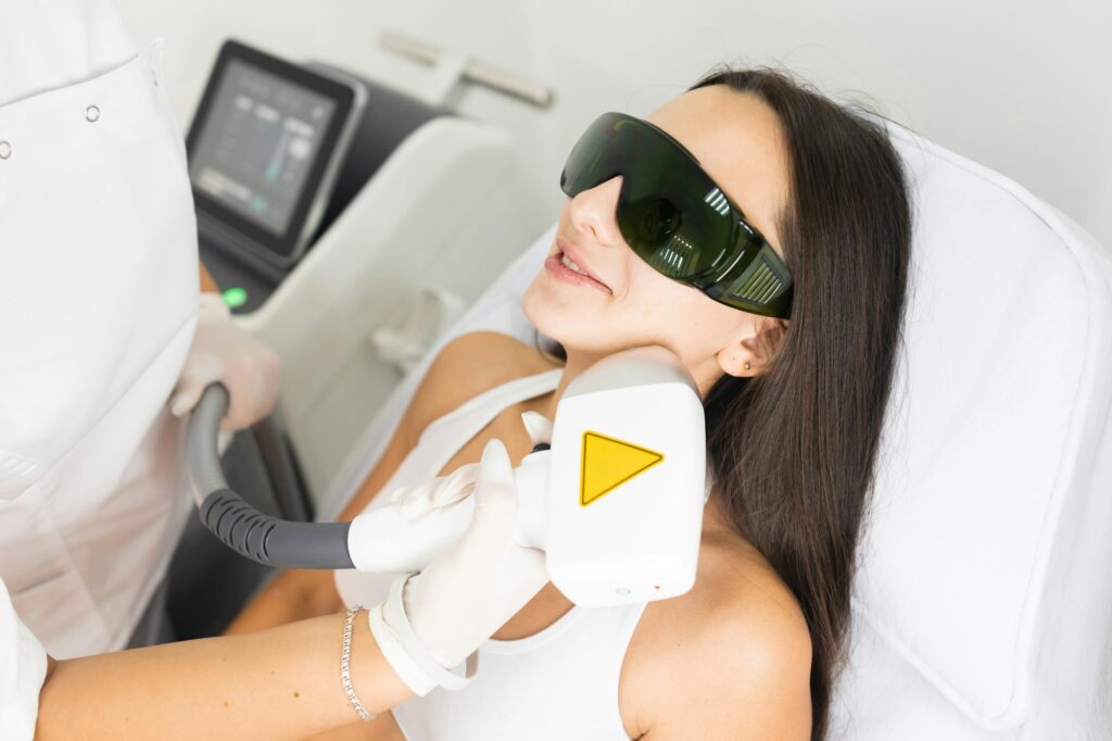 Laser hair removal for facial skin. Woman in epilation salon